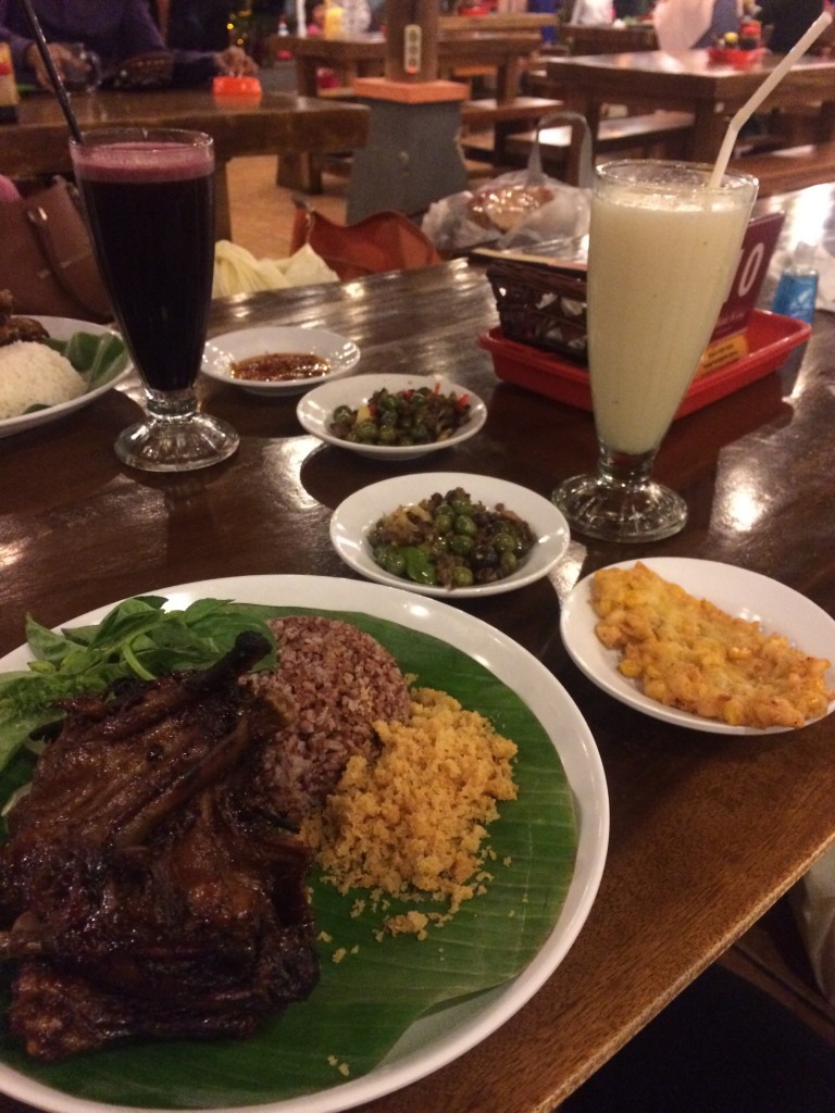Dinner out in Bandung! Duck and rice and corn fritters and who knows what else!