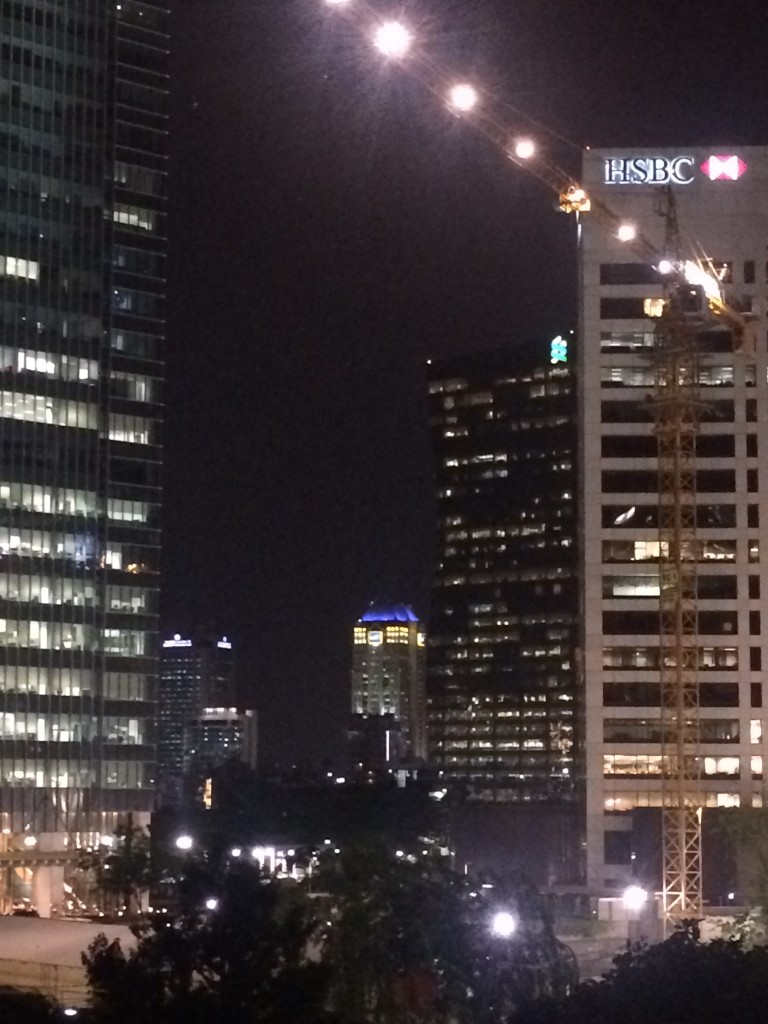 The SCB building is the one with the blue and green squiggle on the top, just behind the white building!