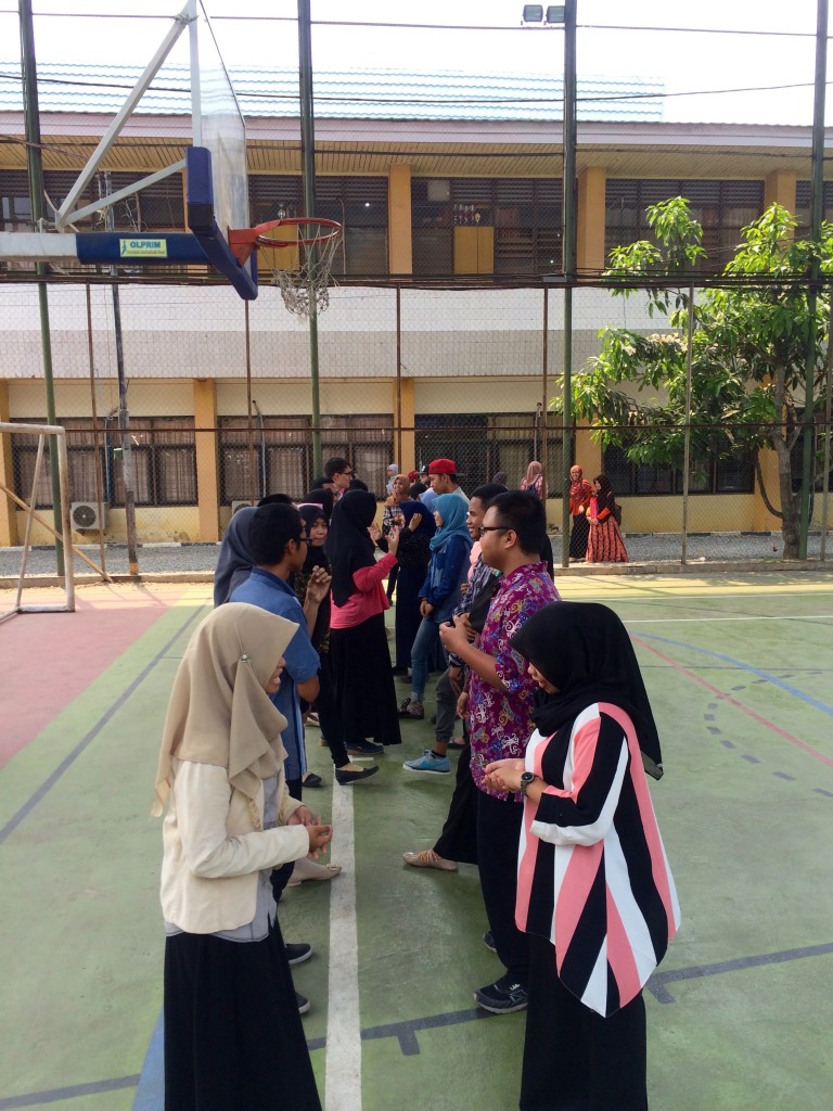 Speed dating on the tennis court because they couldn't find an empty classroom for us