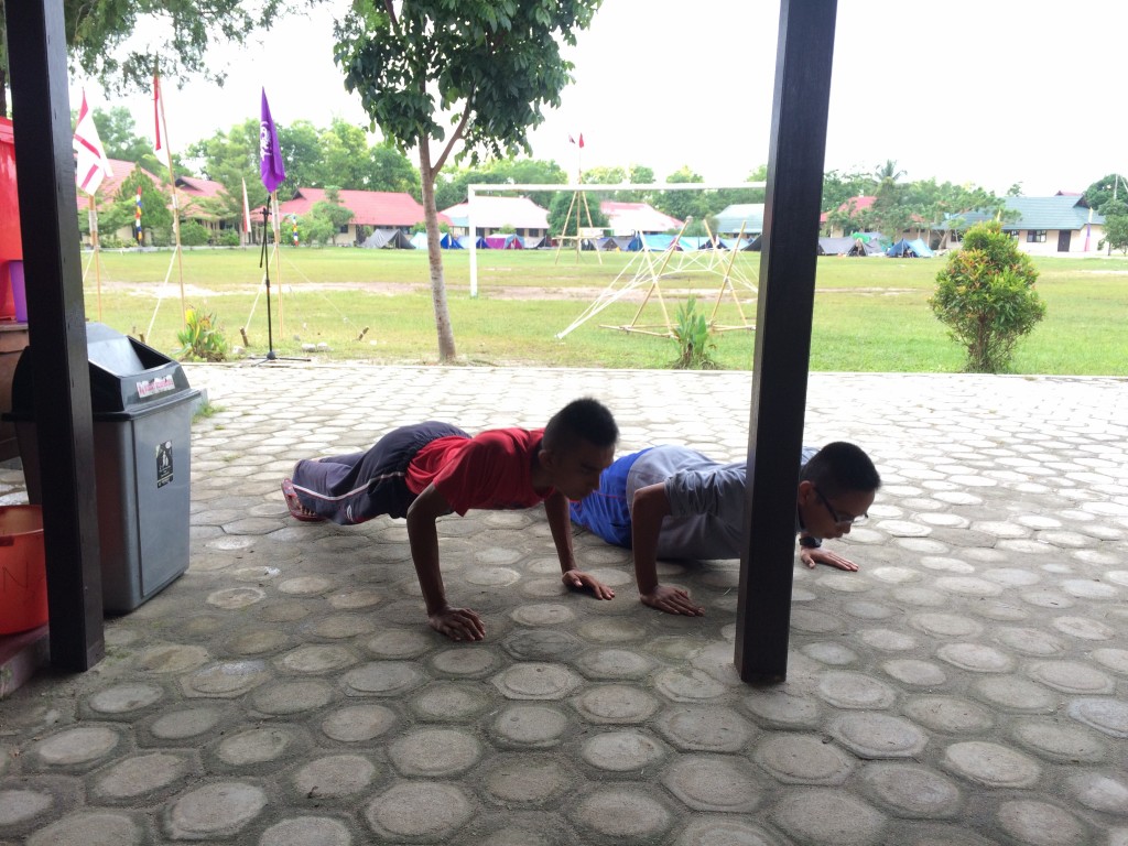 Two boys being punished by the teachers... 